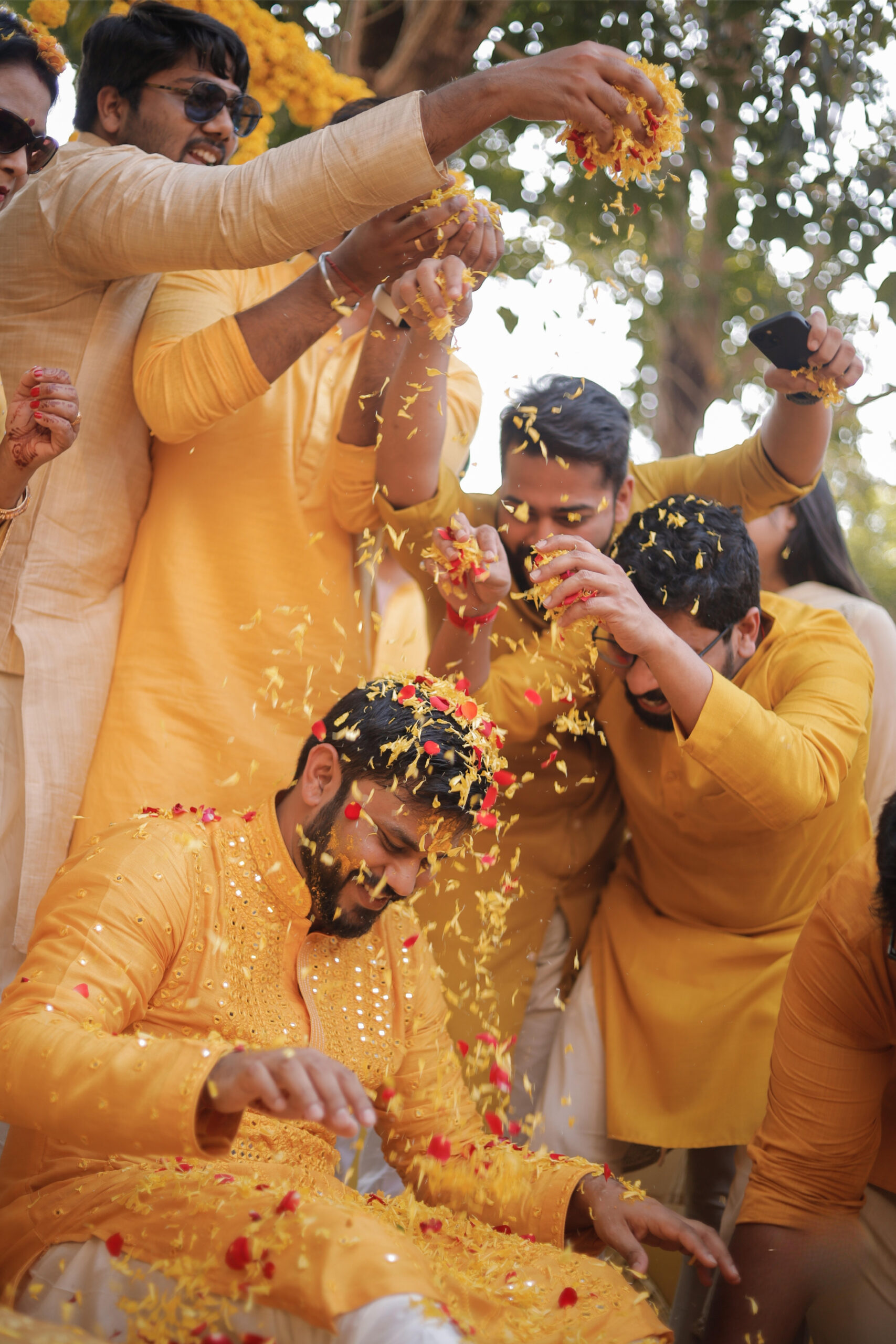 Namrata and Tushar walking hand in hand along Merlin Beach at sunset — candid wedding photography by Cupid Love Stories