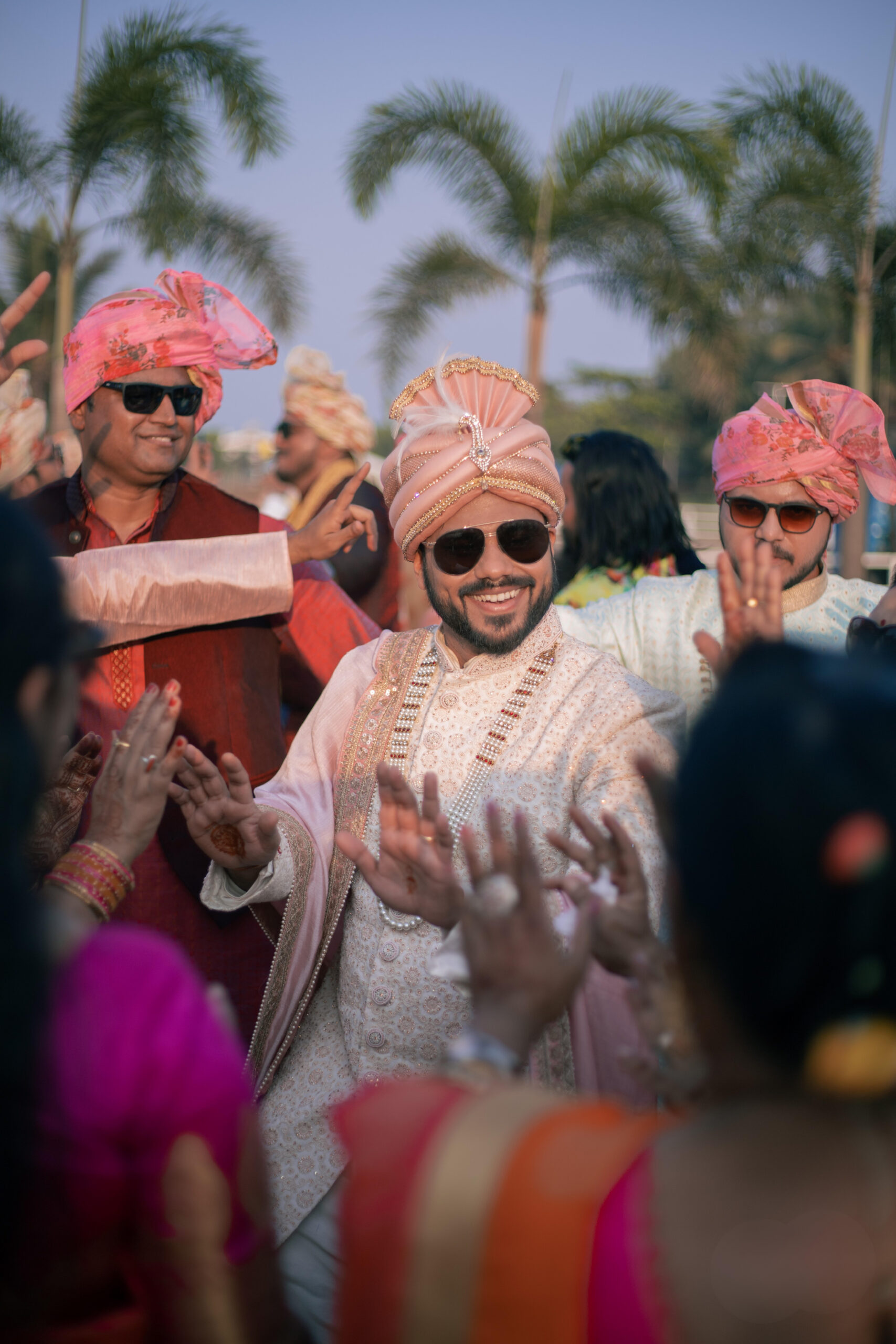 Bride Namrata in elegant attire with the turquoise Andaman Sea in the background at Merlin Beach